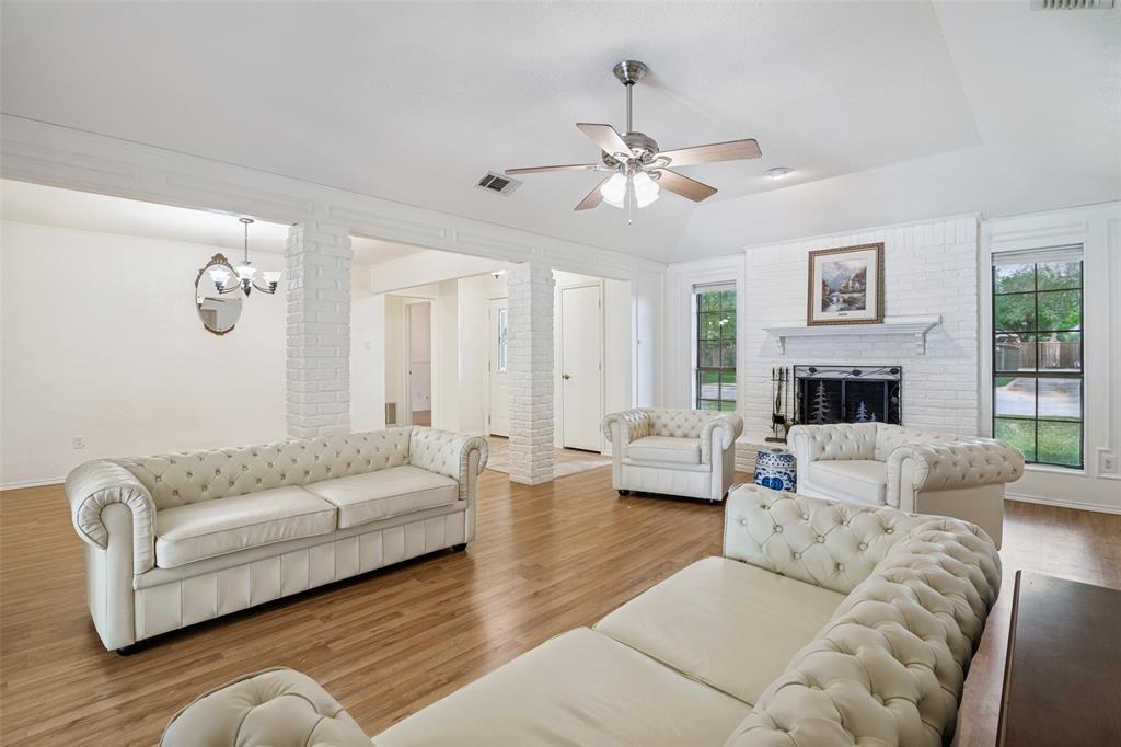 7706 Swiss Way Rowlett, TX 75089 - Photo 7 of 21 Expansive living space featuring ideal for entertaining.