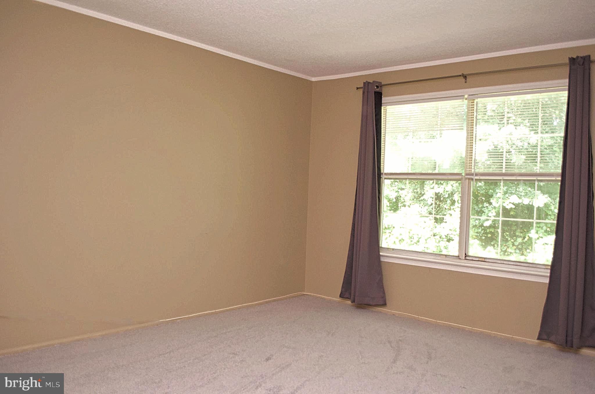 84 Willow Court Hamilton, NJ 08619 - Photo 11 of 18 an empty room with a window