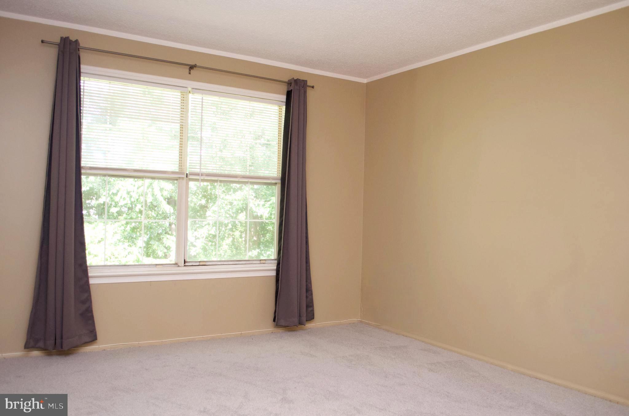 84 Willow Court Hamilton, NJ 08619 - Photo 12 of 18 an empty room with windows