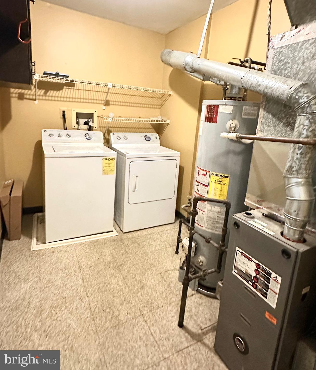 84 Willow Court Hamilton, NJ 08619 - Photo 16 of 18 a utility room with dryer and washer