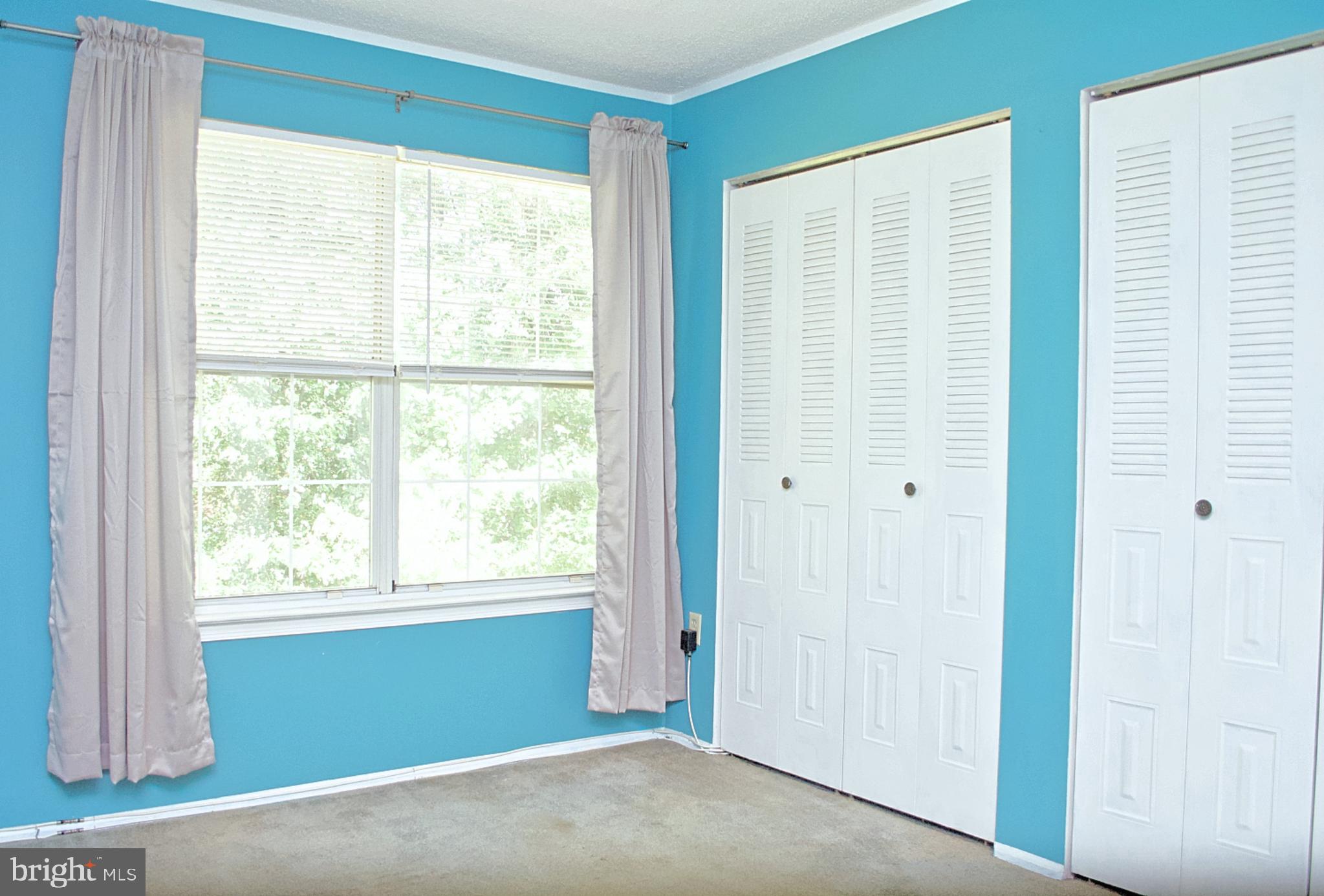 84 Willow Court Hamilton, NJ 08619 - Photo 8 of 18 a view of an empty room with a window