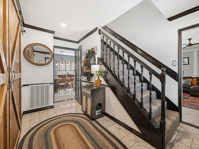 a view of a hallway with washer and dryer