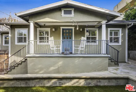 a view of a house with a swimming pool