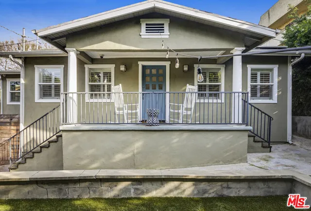 a view of a house with a swimming pool