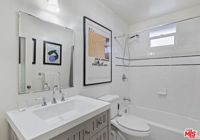 a view of a brick wall with an empty room