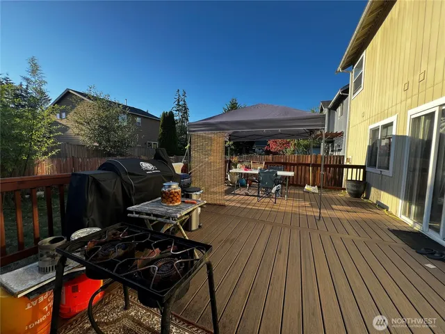 a view of a chairs and tables in the balcony