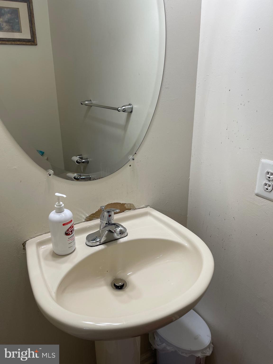 1917 Fuller Street Philadelphia, PA 19152 - Photo 6 of 8 a bathroom with a sink and a mirror