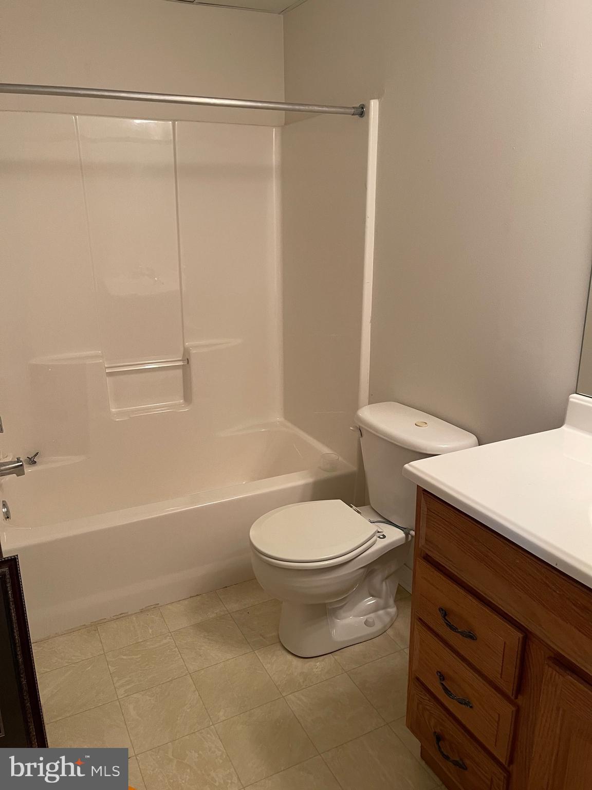 1917 Fuller Street Philadelphia, PA 19152 - Photo 8 of 8 a white toilet sitting next to a bath tub