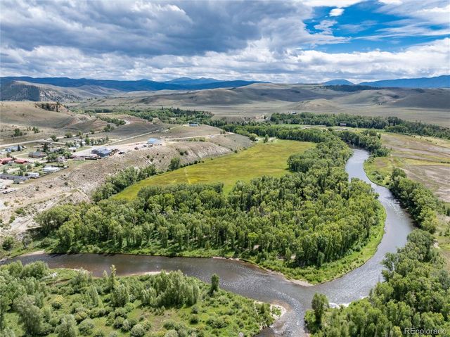 a view of a garden with an ocean
