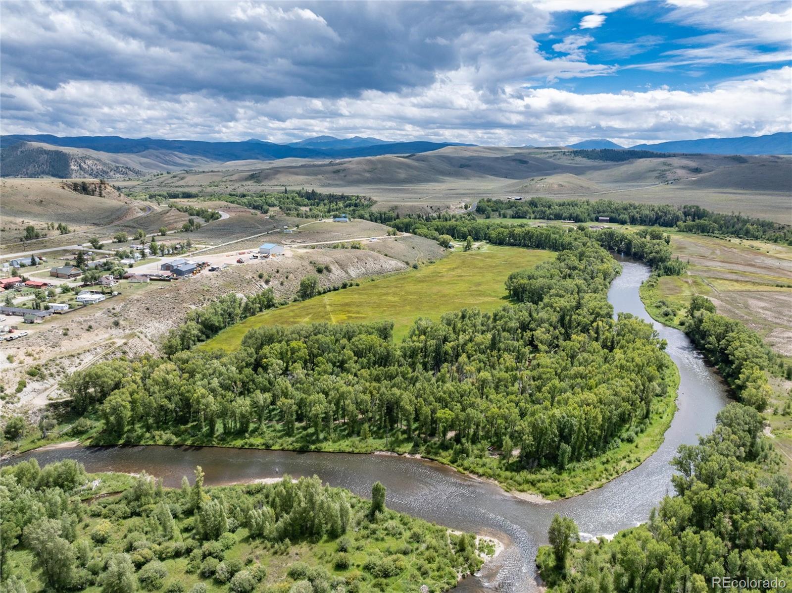 a view of a garden with an ocean