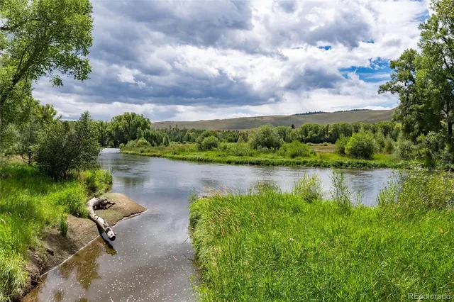 a lake view with a garden