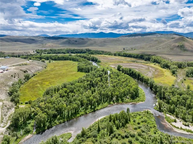 a view of a lake with a mountain