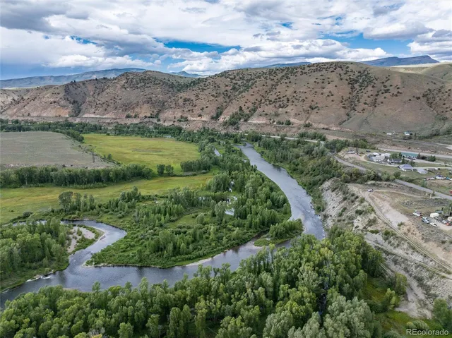 a view of a yard with an ocean beach