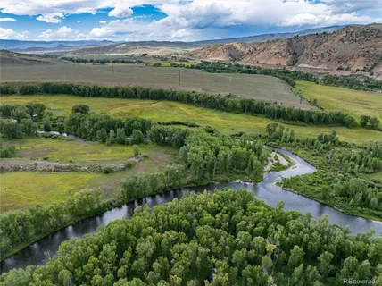 a view of a lake with a city