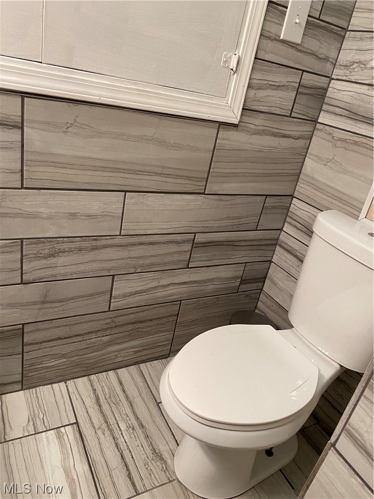 19801 Upper Terrace Road Euclid, OH 44117 - Photo 11 of 22 Bathroom featuring toilet and tile floors