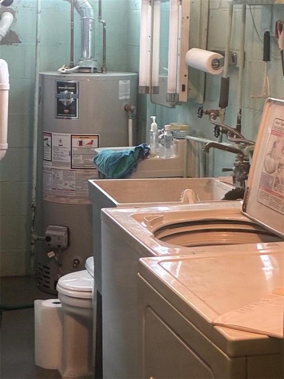 1238 Love Street Pittsburgh, PA 15218 - Photo 12 of 16 a bathroom with a sink and a toilet