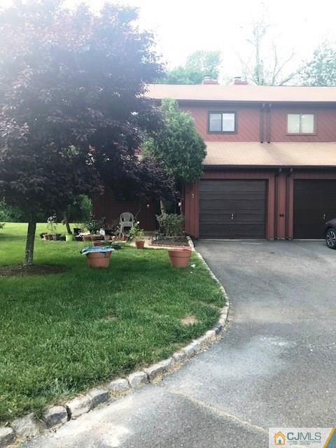 1 Sunflower Court Edison, NJ 08820 - Photo 1 of 15 a view of a backyard with sitting area