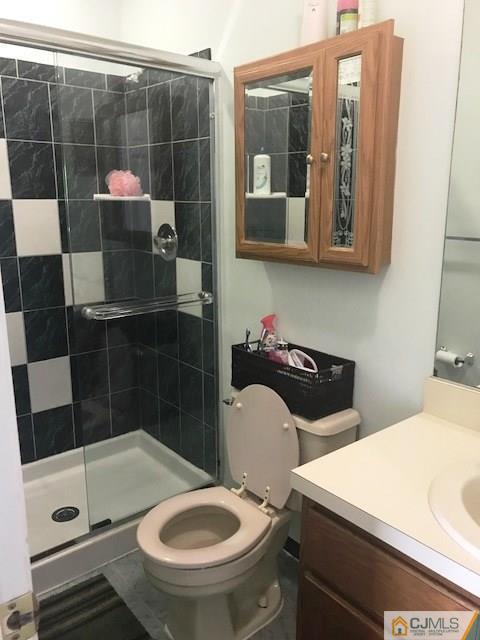 1 Sunflower Court Edison, NJ 08820 - Photo 15 of 15 a bathroom with a sink toilet and shower