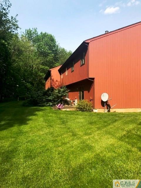 1 Sunflower Court Edison, NJ 08820 - Photo 3 of 15 a backyard of a house with lots of green space