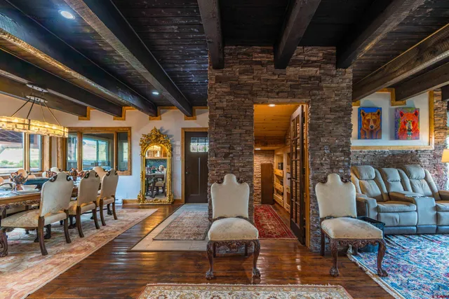 a view of a table and chairs in the balcony