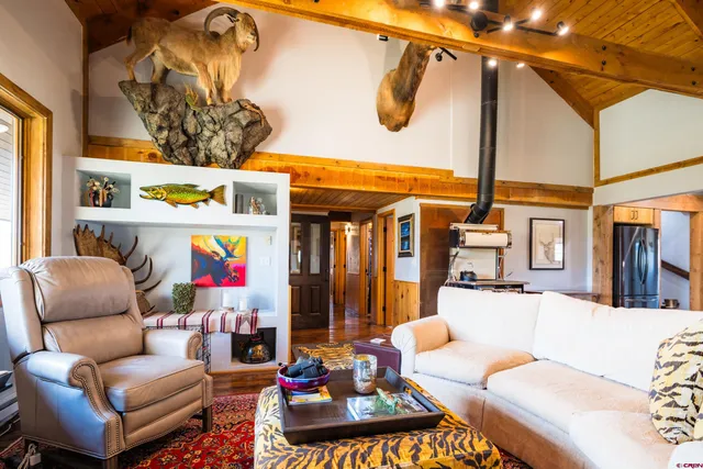 a living room with furniture and a table