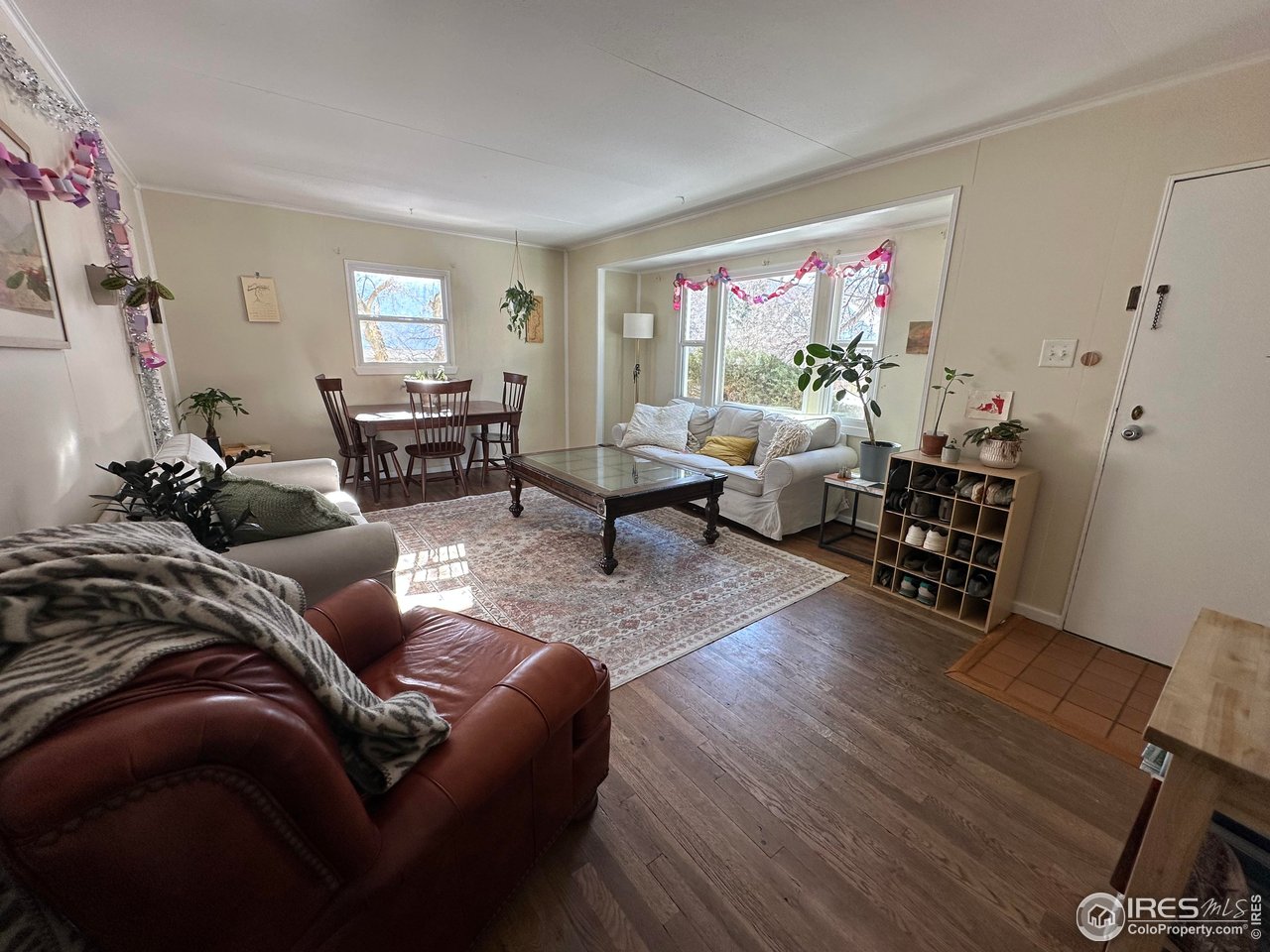 2324 19th Street Boulder, CO 80304 - Photo 10 of 33 a living room with furniture and a window
