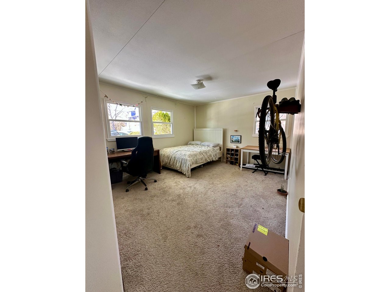 2324 19th Street Boulder, CO 80304 - Photo 16 of 33 a living room with furniture and a gym machine