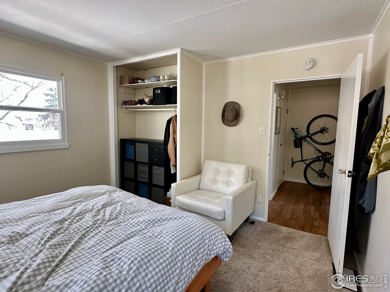 2324 19th Street Boulder, CO 80304 - Photo 18 of 33 a bedroom with bed and walk in closet