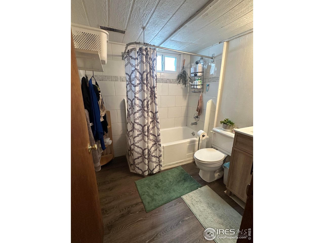 2324 19th Street Boulder, CO 80304 - Photo 26 of 33 a bathroom with a toilet and a shower
