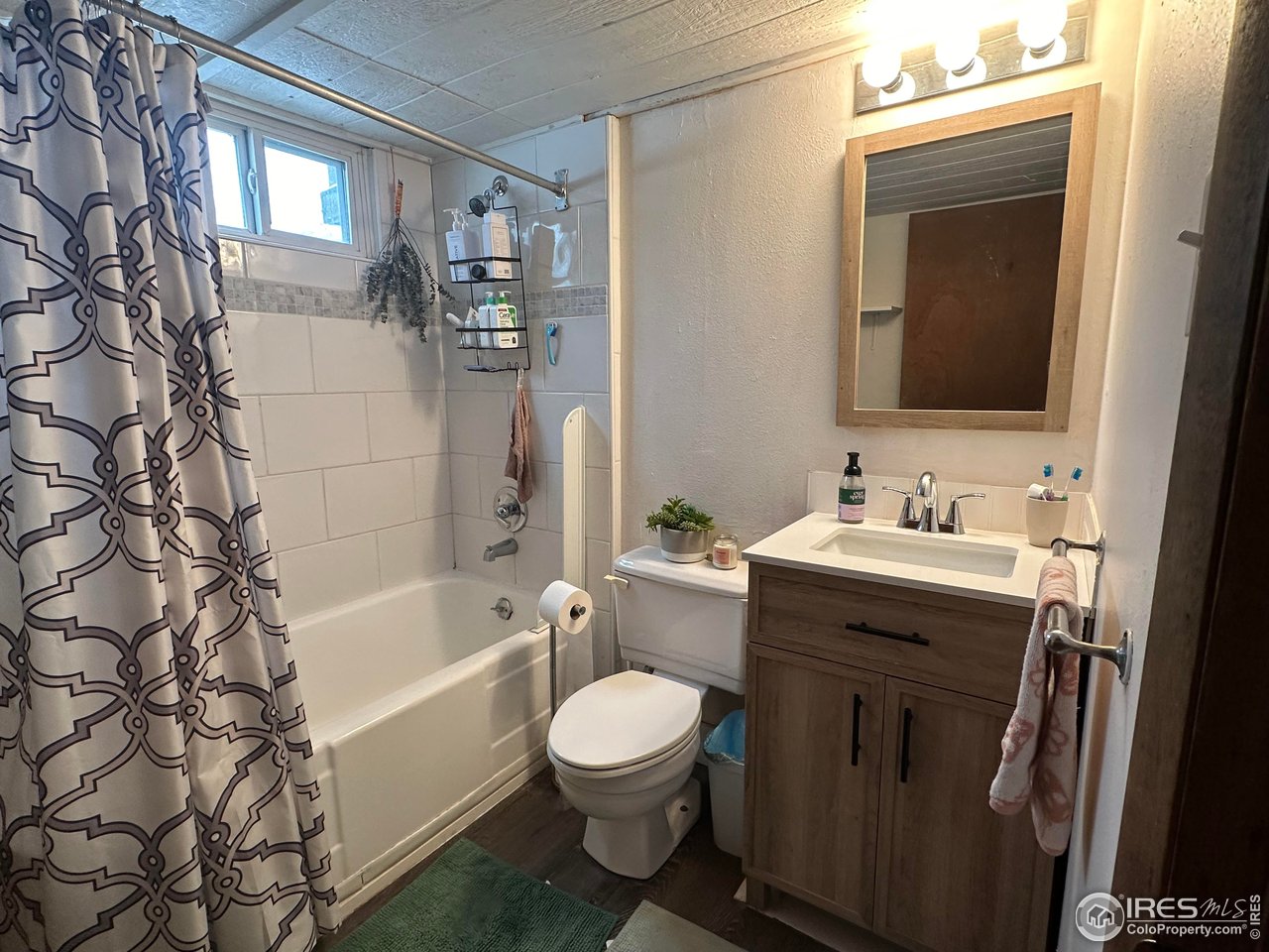 2324 19th Street Boulder, CO 80304 - Photo 27 of 33 a bathroom with a sink toilet and shower