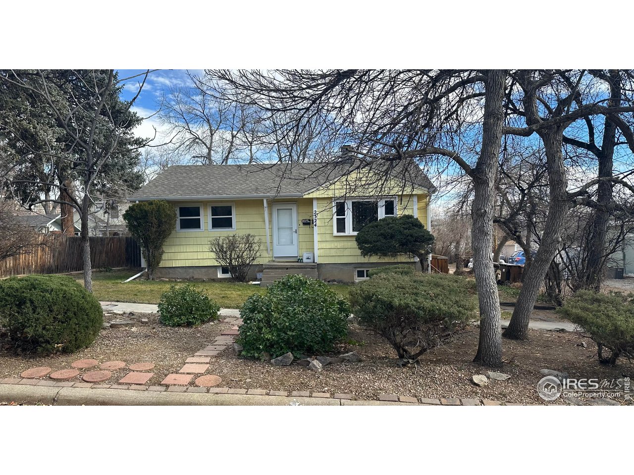 2324 19th Street Boulder, CO 80304 - Photo 30 of 33 a front view of a house with garden