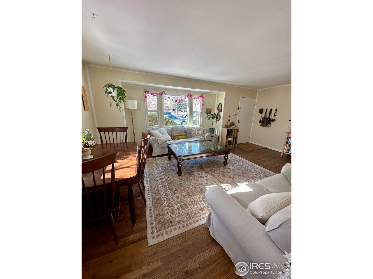 2324 19th Street Boulder, CO 80304 - Photo 32 of 33 a living room with furniture and a floor to ceiling window