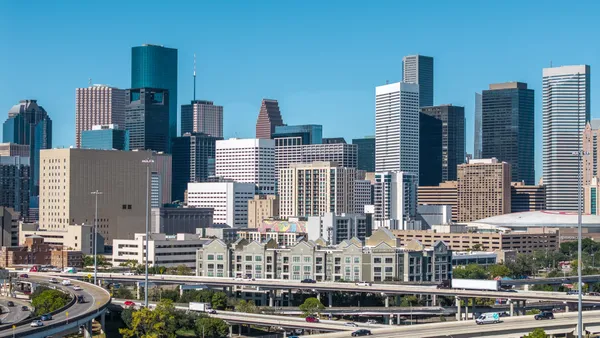 a city view with tall buildings