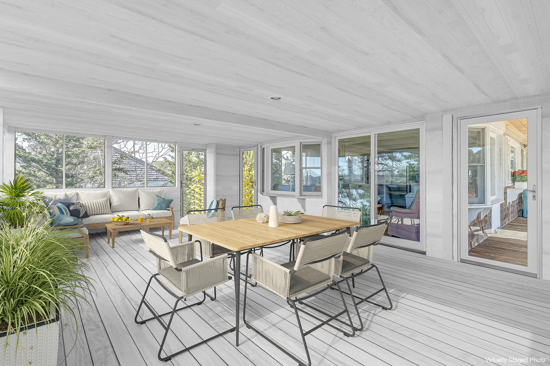 155 Nauhaught Bluff Road Wellfleet, MA 02667 - Photo 18 of 53 a dining room with furniture and wooden floor