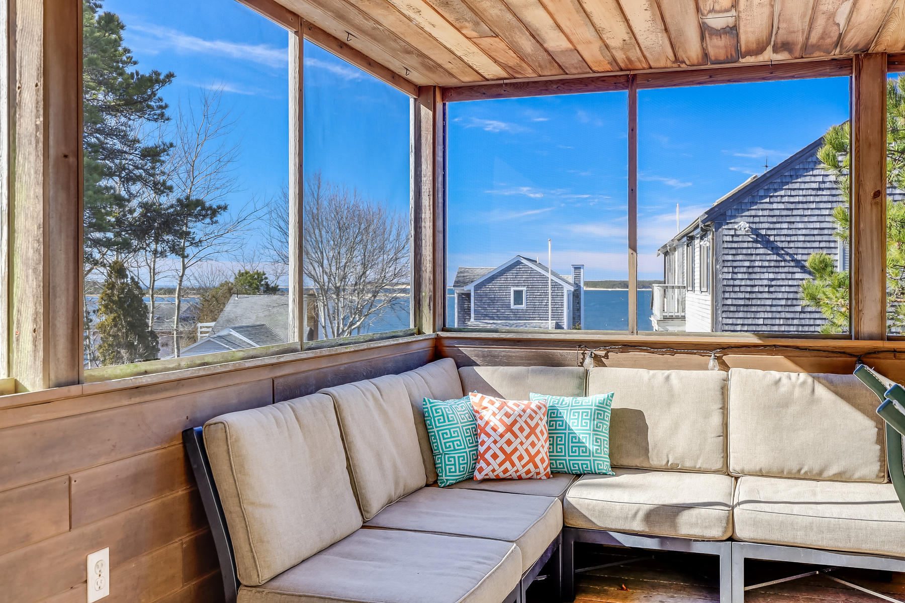 155 Nauhaught Bluff Road Wellfleet, MA 02667 - Photo 19 of 53 a view of a couch in a balcony
