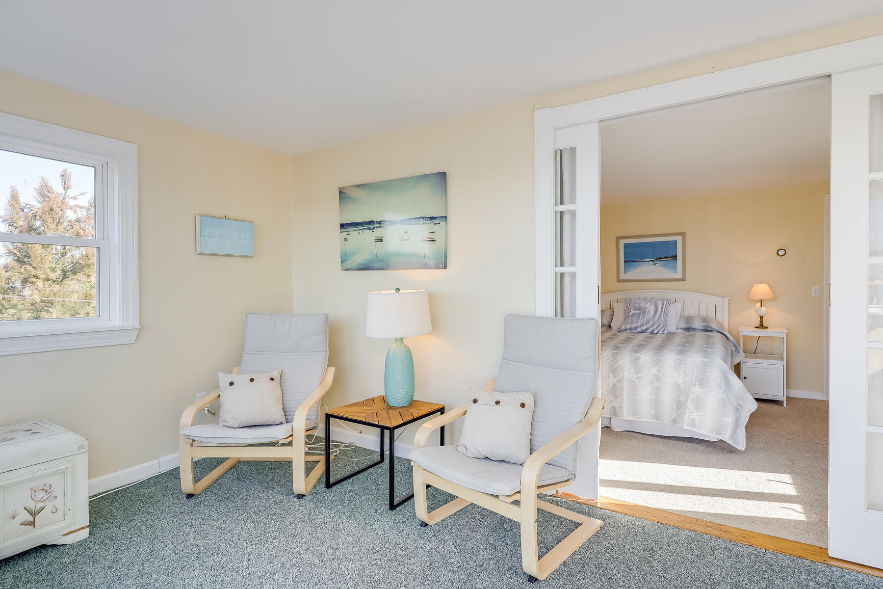 155 Nauhaught Bluff Road Wellfleet, MA 02667 - Photo 26 of 53 a living room with furniture and a window