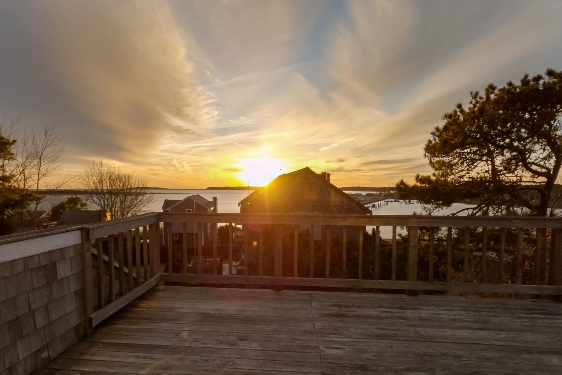 155 Nauhaught Bluff Road Wellfleet, MA 02667 - Photo 33 of 53 a view of a pathway of a houses with wooden fence