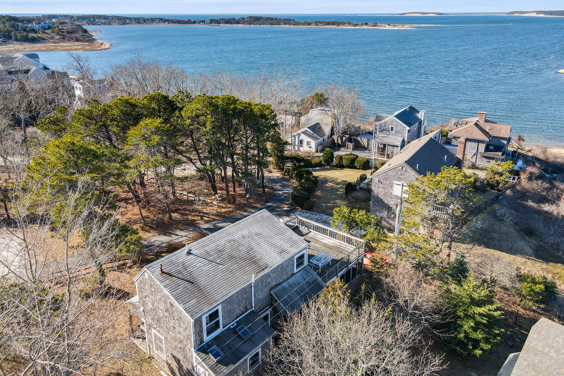 155 Nauhaught Bluff Road Wellfleet, MA 02667 - Photo 40 of 53 an aerial view of a house with a lake view