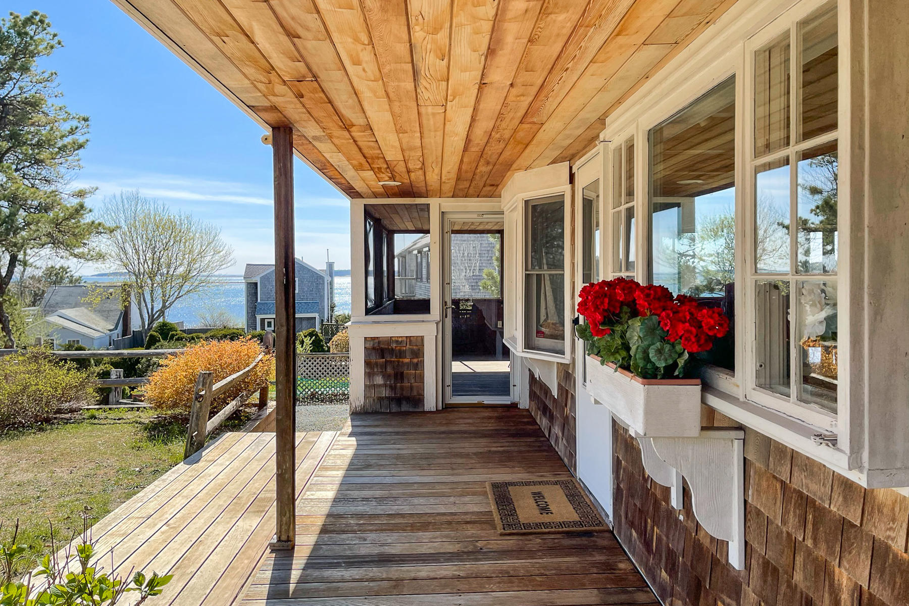 155 Nauhaught Bluff Road Wellfleet, MA 02667 - Photo 44 of 53 a view of a potted flower in front of a house