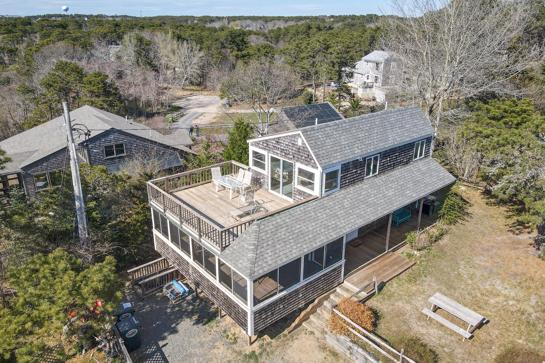 155 Nauhaught Bluff Road Wellfleet, MA 02667 - Photo 48 of 53 an aerial view of a house with a backyard space