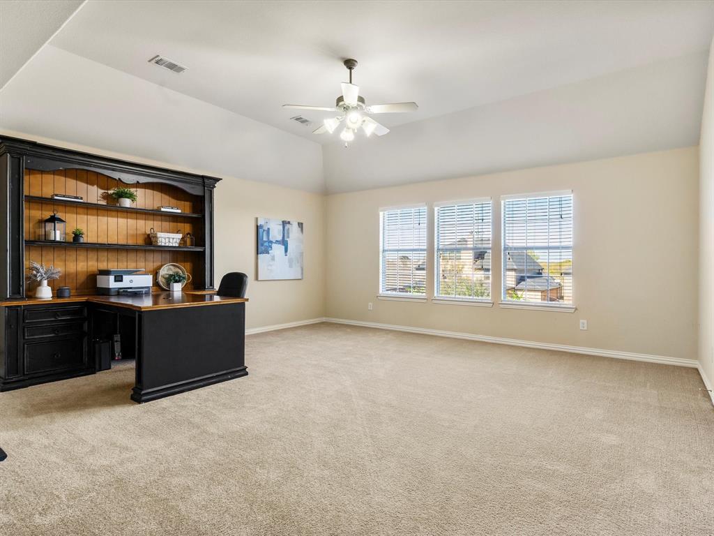 5365 Royal Lytham Road Fort Worth, TX 76244 - Photo 20 of 37 a living room with furniture and a large window