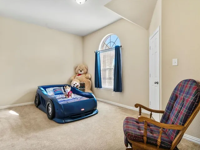 a en suite bathroom with a sink and a mirror