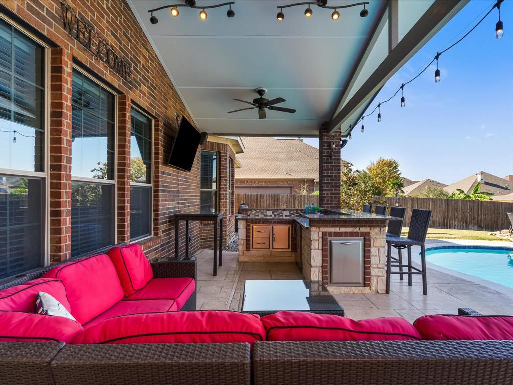 5365 Royal Lytham Road Fort Worth, TX 76244 - Photo 31 of 37 a building outdoor space with patio furniture and a potted plant
