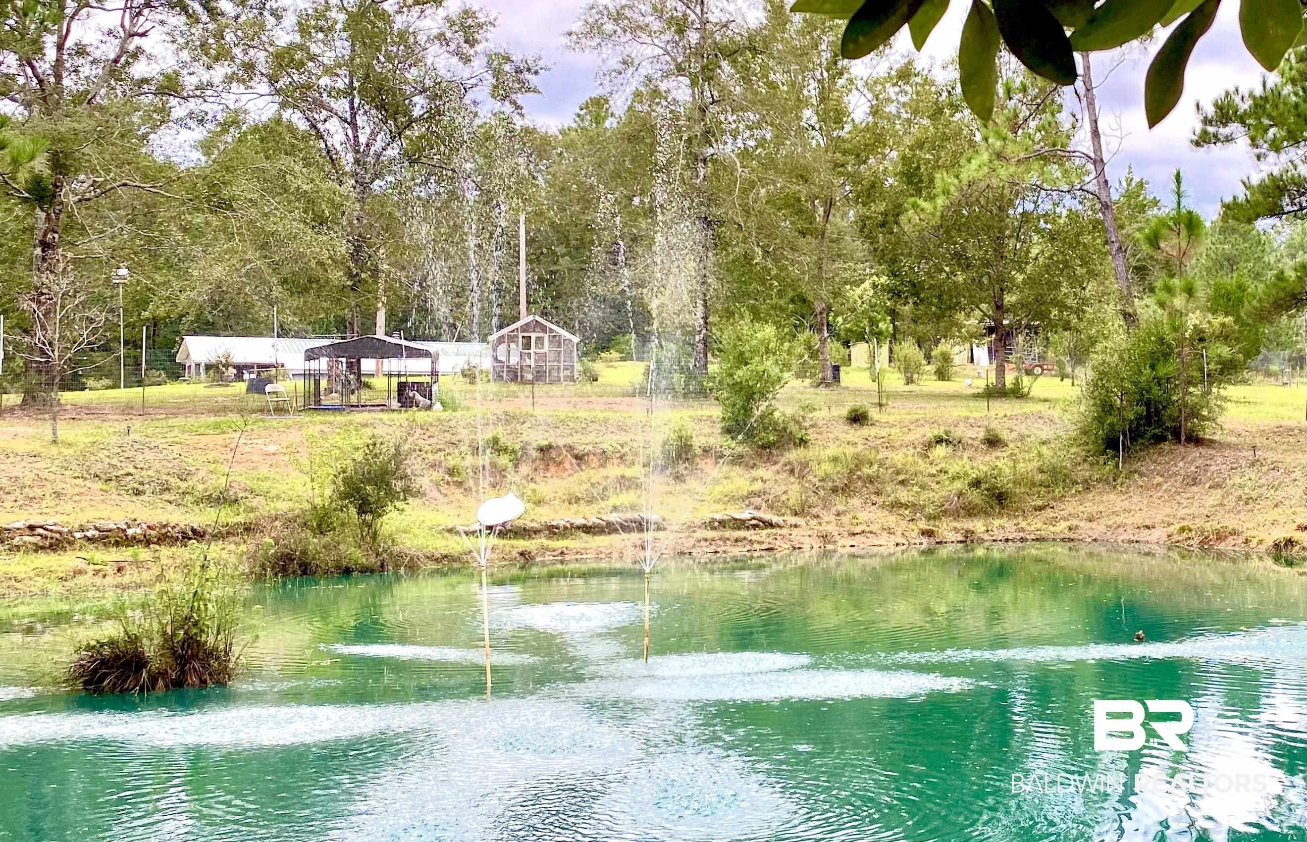 21305 River Road Robertsdale, AL 36567 - Photo 32 of 50 POND w/FOUNTAIN