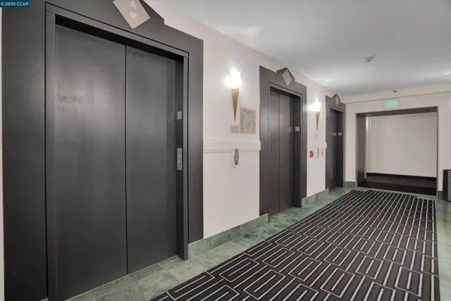 a view of hallway with wooden floor