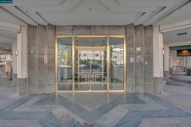 a view of a bathroom with a glass door shower