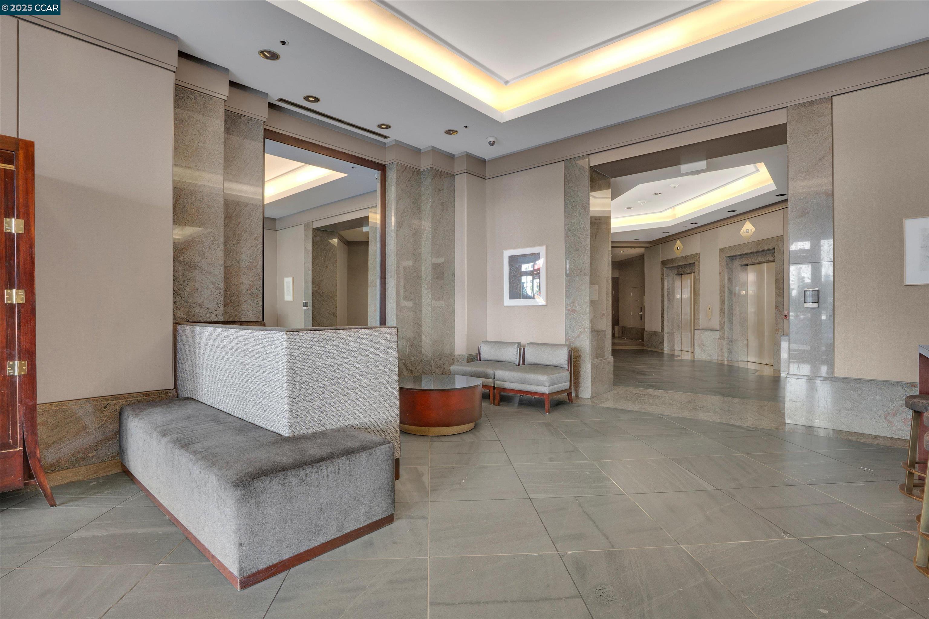 300 3rd Street, Unit 1203 San Francisco, CA 94107 - Photo 22 of 25 a living room with furniture and a potted plant