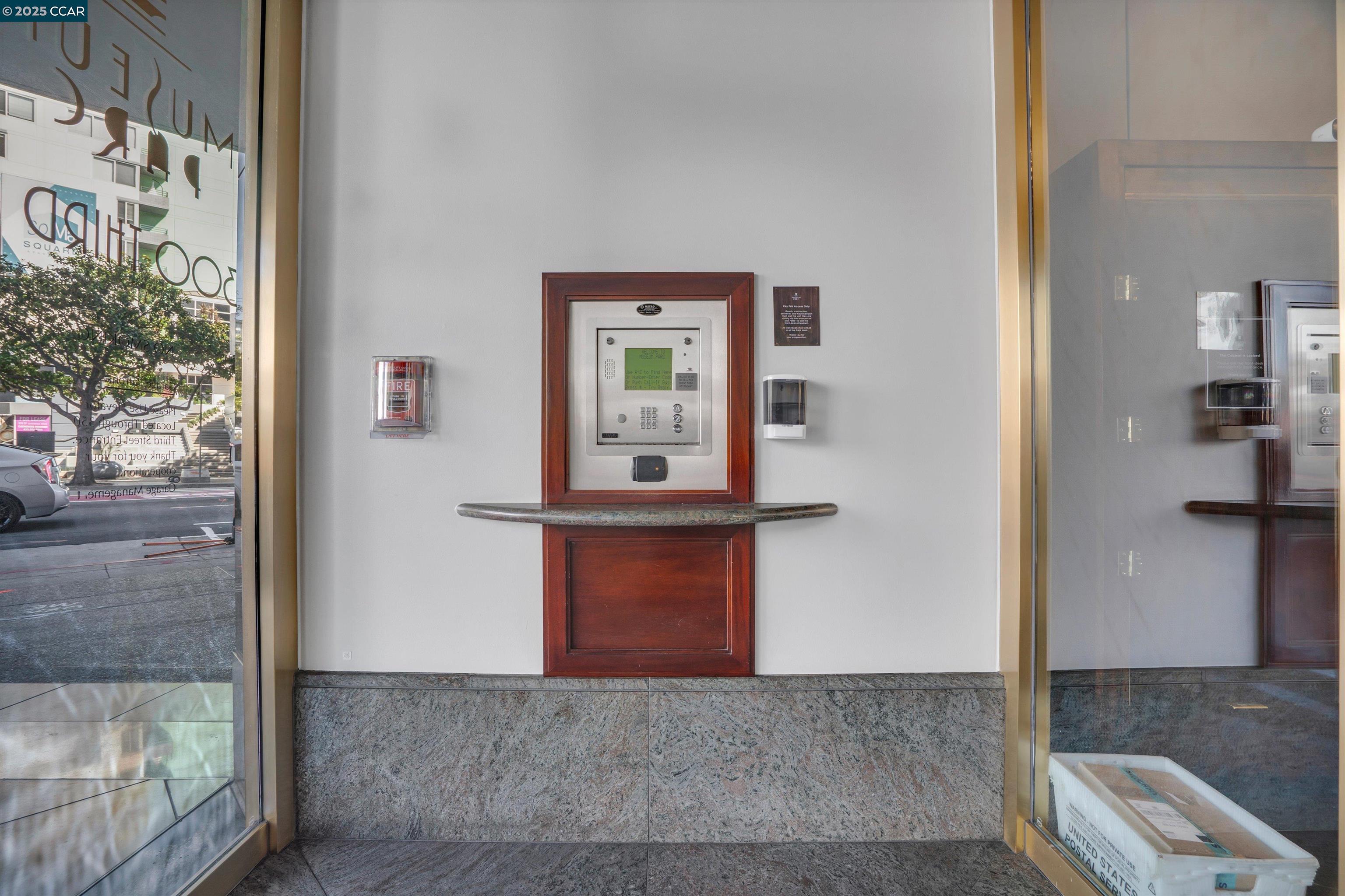 300 3rd Street, Unit 1203 San Francisco, CA 94107 - Photo 23 of 25 a view of a hallway with wooden floor and a living room