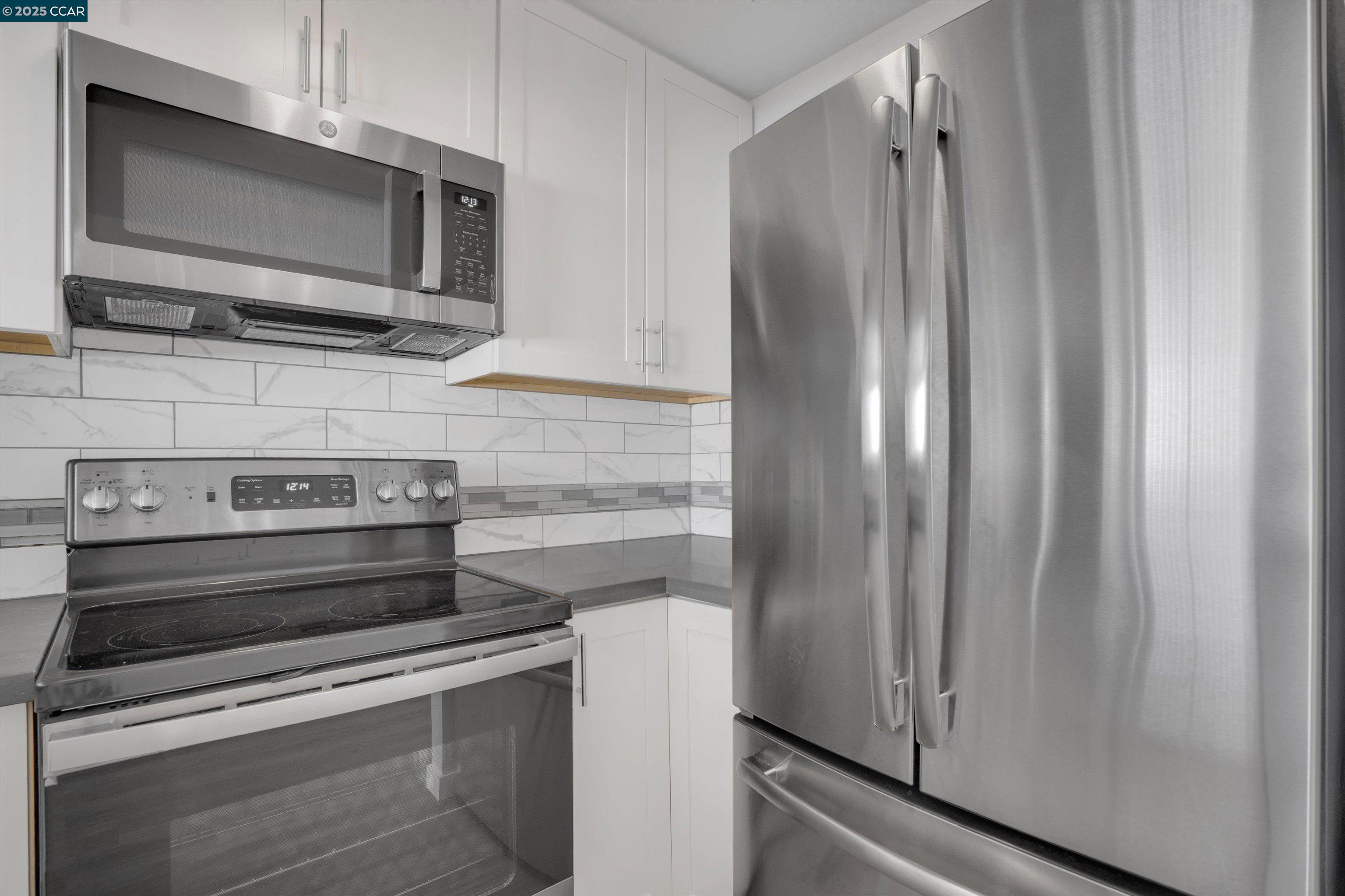 300 3rd Street, Unit 1203 San Francisco, CA 94107 - Photo 5 of 25 a view of a kitchen with appliances
