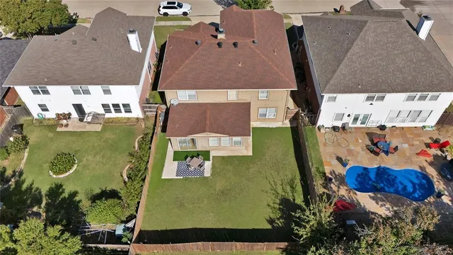 a front view of house with outdoor seating and yard